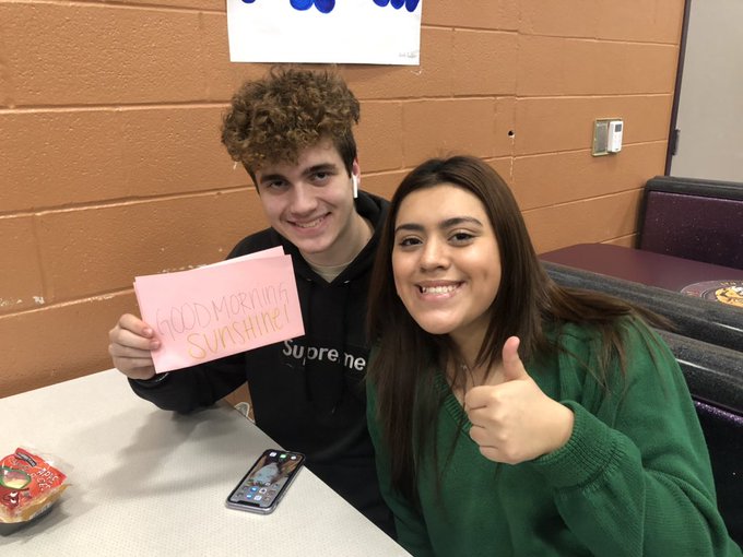 #WHSRAK. Presidents Council member senior Demaris Pelayo shares a RAK with a new friend, senior Brayden Sprat. As part of the councils RAK initiative, members are posting positive messages on social media and on post-its around the school. 