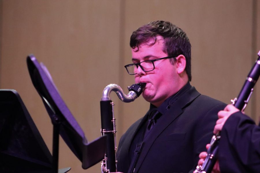 BEST OF THE BEST. During the opening ceremonies of the spring semester, junior Aaron Johnston performs during a fine arts showcase. Johnston is a member of the All-State and will attend the clinic and concert during TMEA this week in San Antonio. 