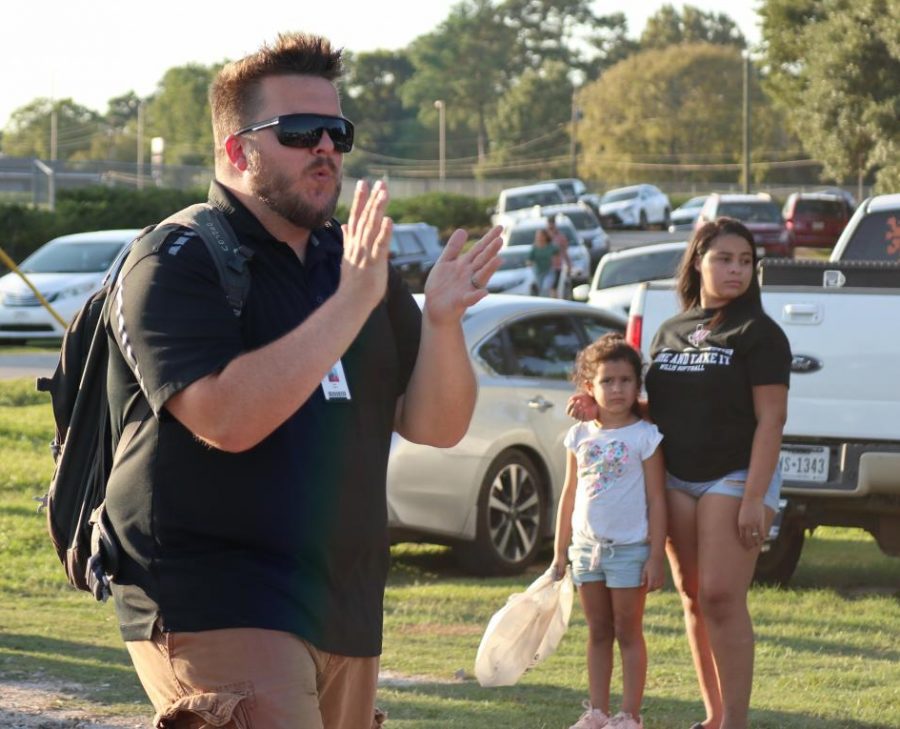 Assistant+Band+Director+Andrew+Hicks+marches+with+the+band+during+the+homecoming+parade.+Hicks+was+recently+named+the+head+band+director+at+Burnet+High+School.+