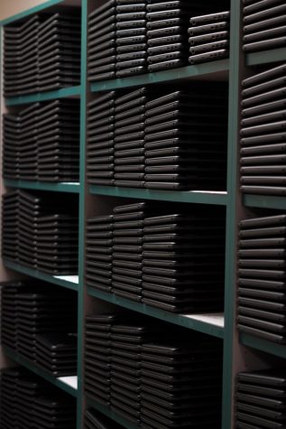 Stacks of Chromebook wait to be distributed at he first of the year. These computers were essential when school went online during the COVID-19 pandemic.