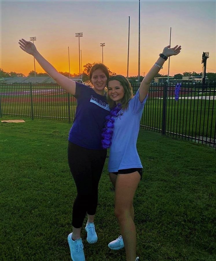 GOOD MORNING CLASS OF ‘21. Seniors wake up bright and early to welcome the sun on their first day of school. Even though they’re in the middle of a pandemic, seniors Jenna Day and Lindsay Davenport came together in small groups to take pictures at Yates Stadium to remember the exciting day. “This morning, as the sun rose, it really set in that I am a senior now and even though I’m upset about the way it started, we, as a class, are doing our best to make the most out of it,” Davenport said. 
