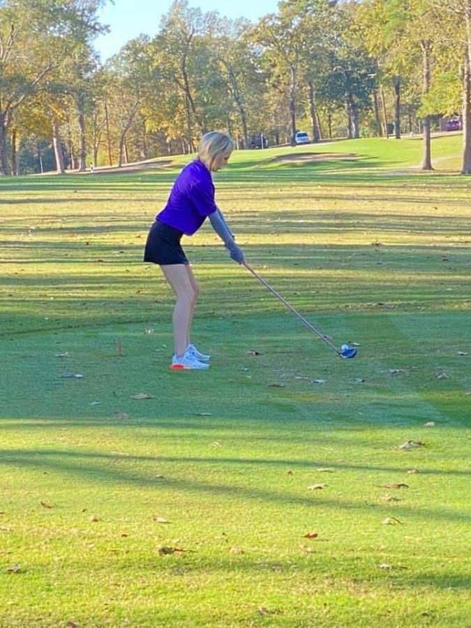 FOURTH PLACE FINISH. Playing on home turf, junior Madi McCollum finishes strong on the course at Panorama. The girls' team finsihed first overall. 