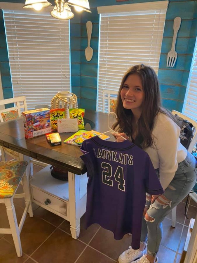 READY TO RETURN. Before headed to surgery, sophomore Mazzy Heyer received her jersey and a care package from the softball team. 