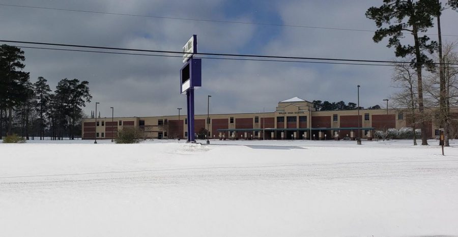 IN A SEA OF WHITE.  Willis High School under a blanket of snow is an unusual sight. The school was closed from February 15-19 due to an ice and snow storm that left most of Texas facing water and power problems. Classes will resume February 22. 