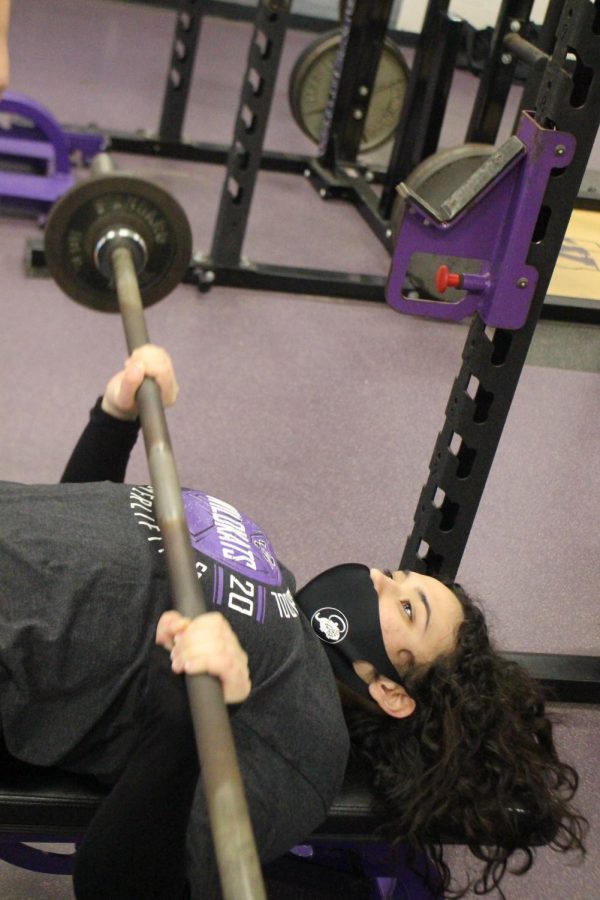 HEADED TO REGIONALS. During a practice session, junior Janice Maldonado works on getting stronger for the regional meet. Maldonado is one of four lifters competing Wednesday, March 3 in Alvin.