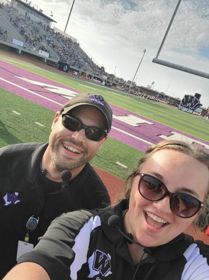 DIRECTORS SELFIE. At the first game at Berton A. Yates Stadium this year, new assistant director Aly Clarbut takes a selfie with new head band director Josephy Dittfurth. 