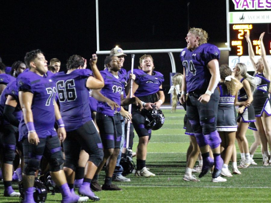 HEY HEY HEY GOODBYE. The varsity football team celebrates after a huge win against Bellaire. With many hard plays behind them, senior Zach Rogers celebrates with a huge leap into the future, hoping for another win. 
