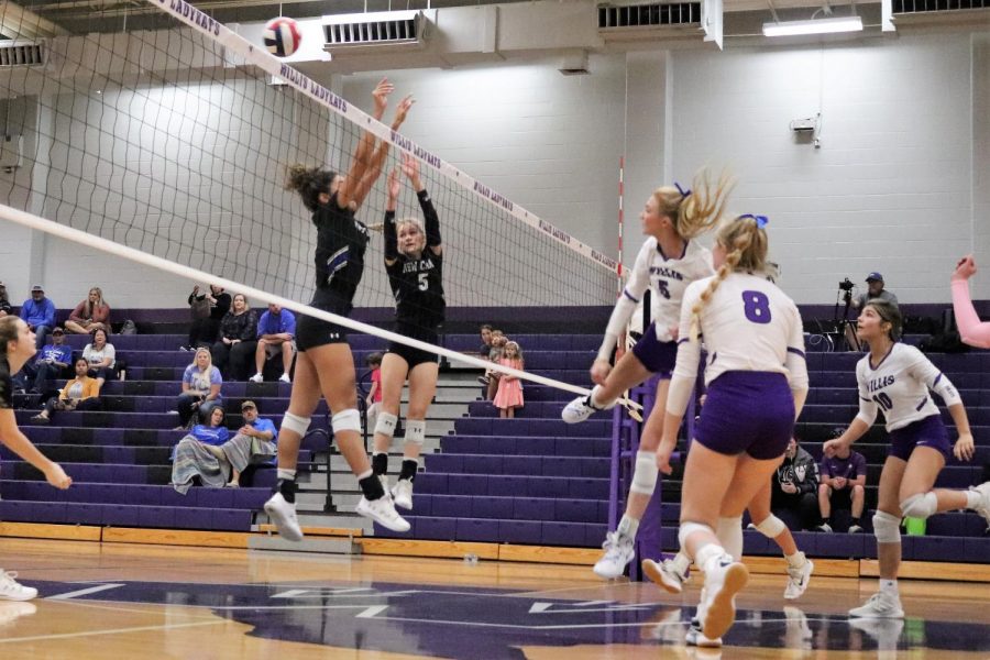 PURE POWER.  In a game against New Caney, senior Taylor Thomas sends the ball over the net. The team swept the Eagles in three sets. 