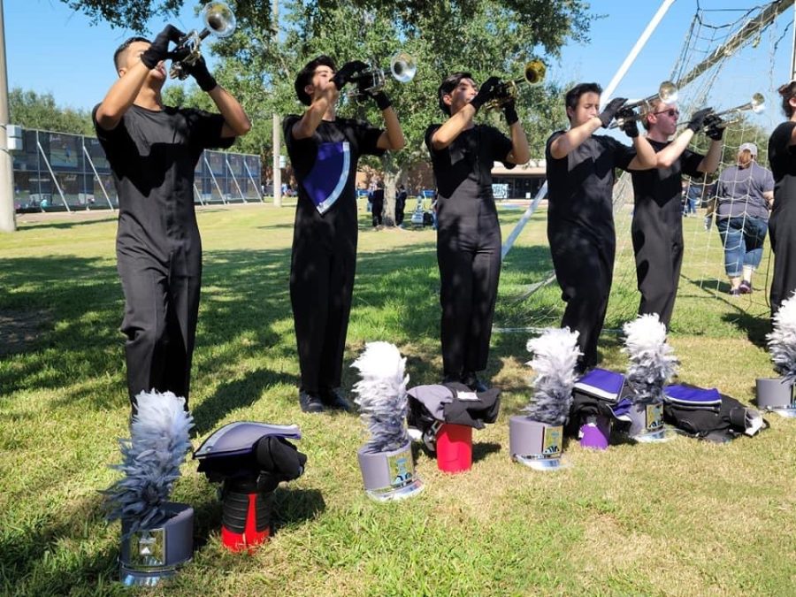WARMING UP.  Before performing at the Small Town Big Sound contest in Friendswood, members of the trumpet section get ready for the show. 