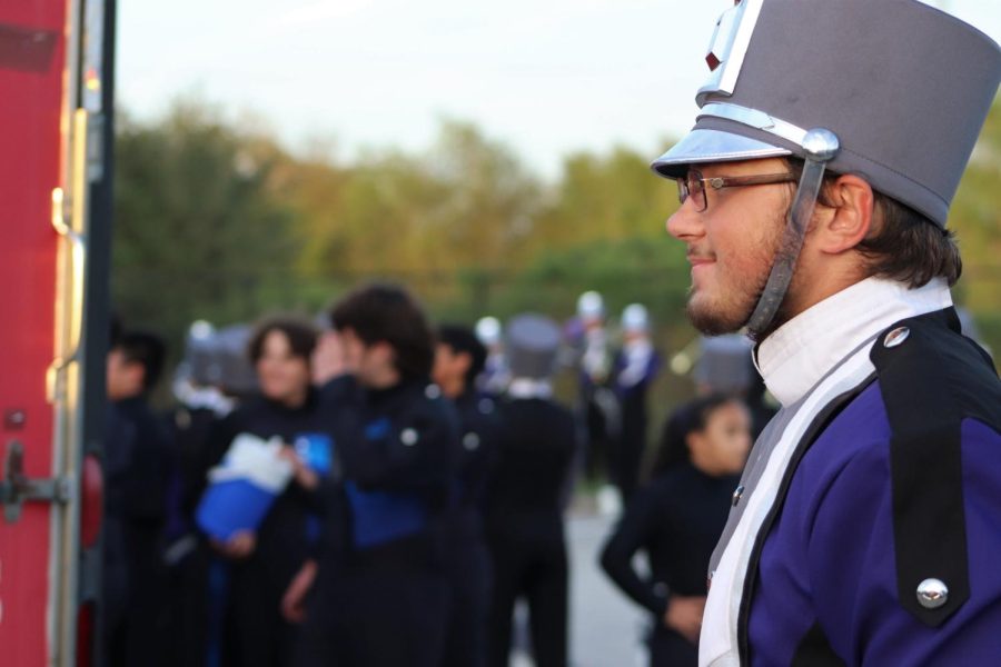 SENIOR SEASON. Preparing for his last regional contest, senior Jeffrey Blaker enjoys the calm before the storm. 