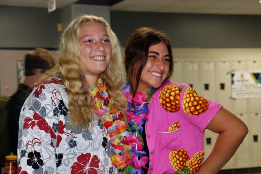 TROPICAL VIBES. Dressed in bright Hawaiian colors and leis, sophomores Dakota Casey  Kristina Guardado participate in Red Ribbon Week on Thursday. 