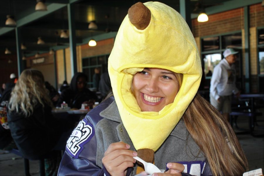 A-PEAL-ING COSTUME. During lunch senior Kristina Jones eats while wearing her Halloween costume. Fridays dress up day was themed around costumes because Drugs are Scary.