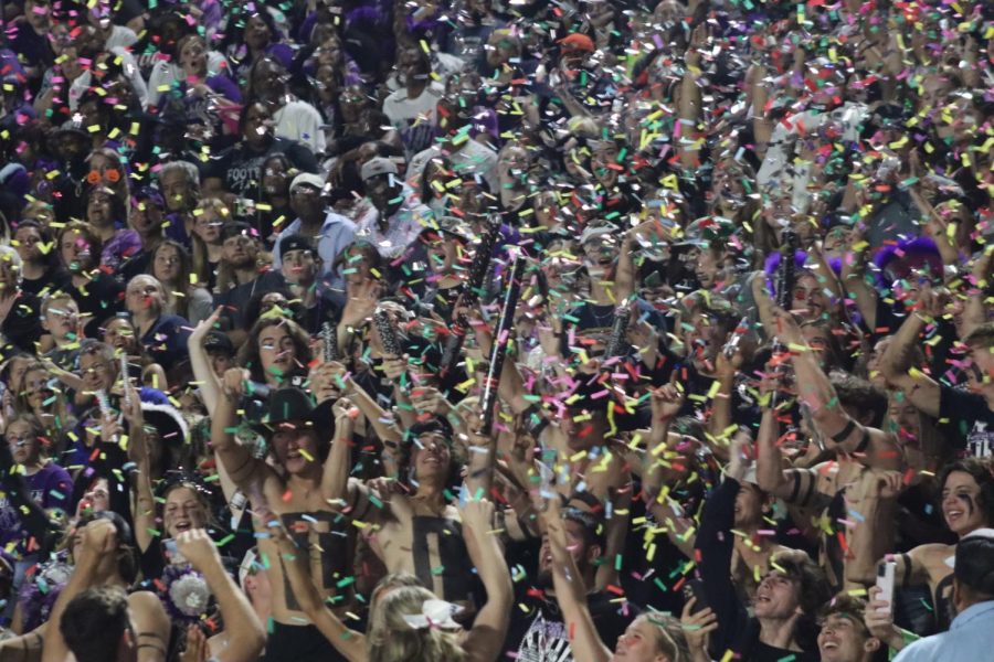 HOMECOMING SPIRIT. The student section goes crazy during the homecoming game. 