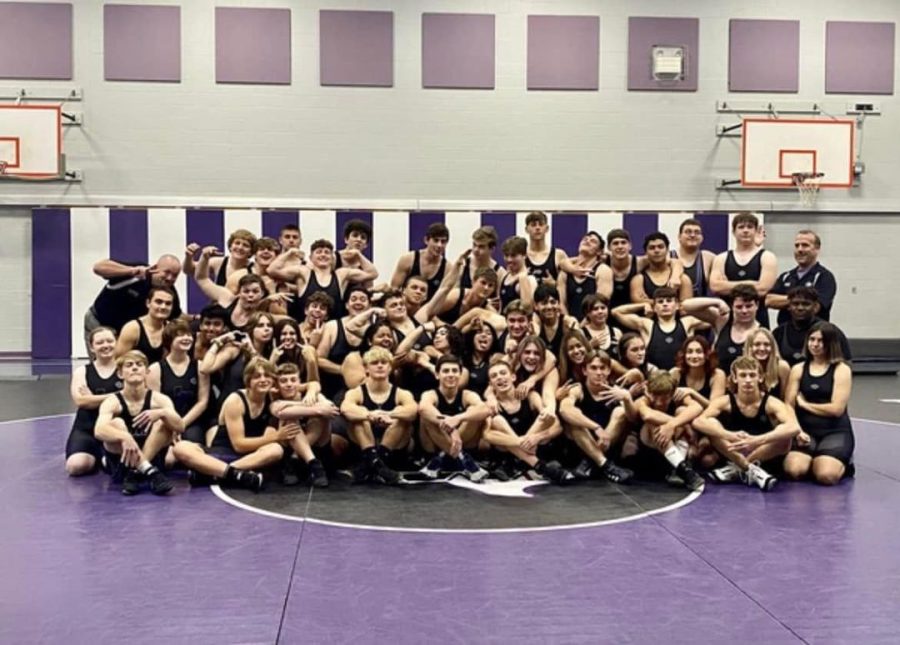 REFUSE+TO+LOSE.+Member+of+the+wrestling+team+kid+around+after+their+team+picture.+The+team+has+grown+under+the+direction+of+Coaches+Bryan+Thomas+and+Brian+Blake.