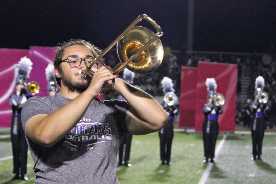 SENIOR NIGHT TIMES TWO. Playing with band during halftime and playing varsity football, senior Jeffrey Blaker was honored by both groups on Friday night.