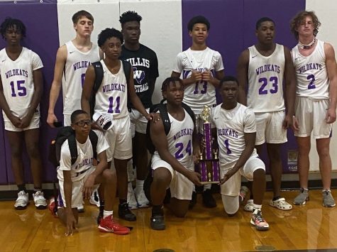CHAMPIONS. The freshman basketball team went undefeated at their home tournament Dec. 9-11.