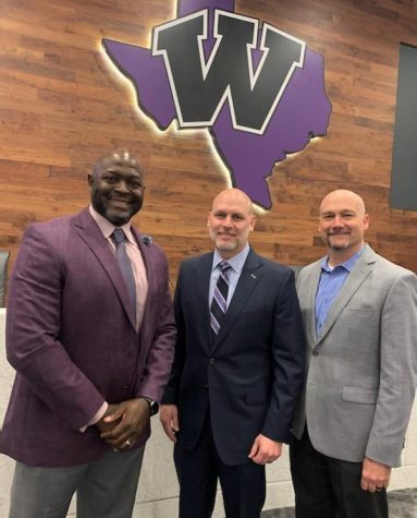 ONE TEAM, ONE PURPOSE. Jason Glenn stands with Superintendent Dr. Tim Harkrider and Assistant Superintendent of Innovation, Teaching & Learning, Dr. Brian Greeney at the board meeting on Wednesday. Glenn was named the Executive Director of Athletics and Fine Arts at the meeting. 