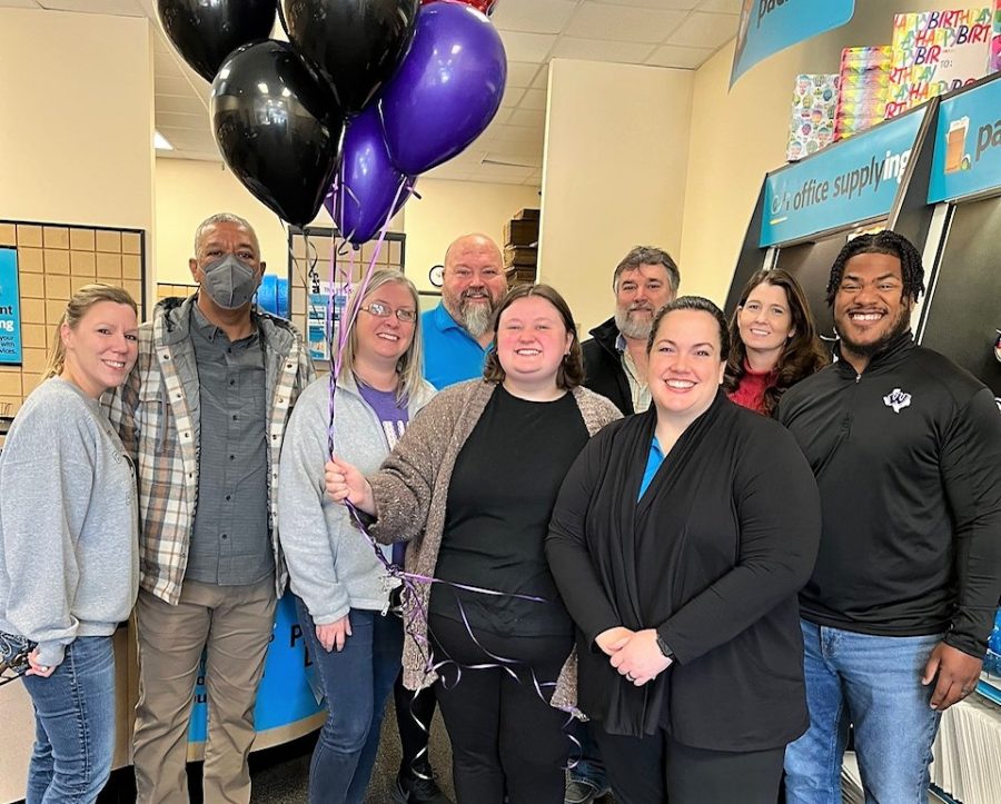 CARING. A group of teachers decide to thank the local post office for their service to the community.