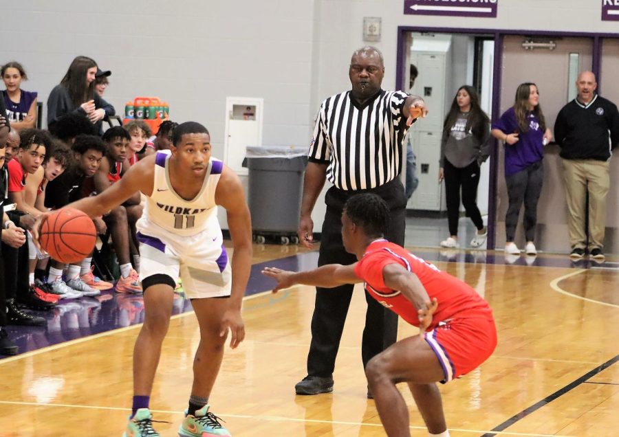PLAYING HARD. During the game against the Oak Ridge Eagles, senior Terrance Patterson scored 10 points.