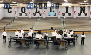 PREPPING FOR SUCCESS. At a contest at Klein Collins, members of the indoor percussion group readies to play. The group will compete at the state competition in April. 