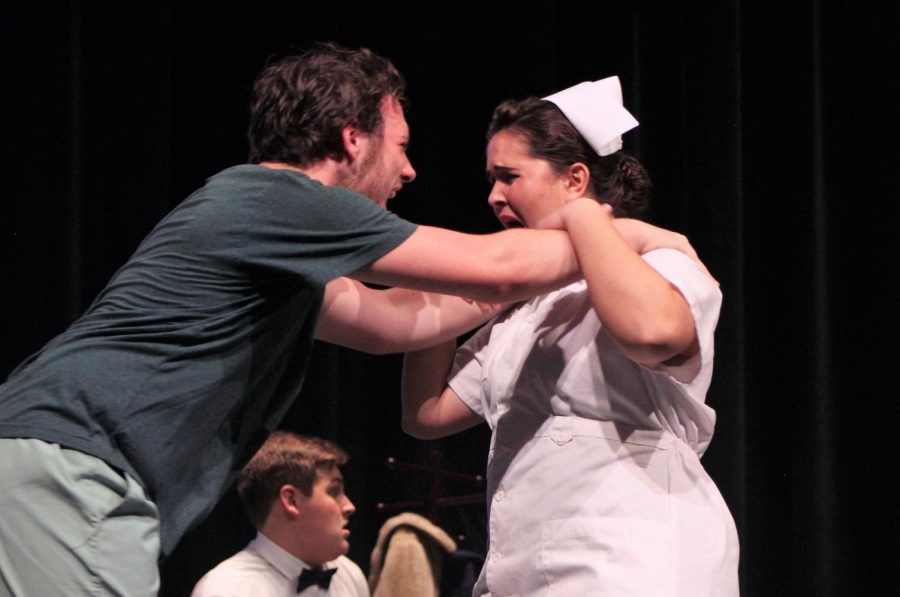 POWER STRUGGLE. During the climax of the One Flew Over the Cuckoos Nest, McMurphy played by senior Josh Brookshire chokes Nurse Ratched played by senior Zoe Picken. The One Act Play will compete in their district competition on Wednesday at Grand Oaks High School. photo by Kendall Cobb
