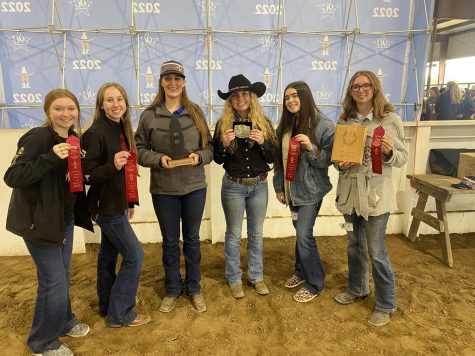 FFA PROUD. Members of the horse judging team shows off their ribbons and trophies after a successful competition at the Houston Livestock Show. Members are Brooke Carr, Morgan Christopher, Maeghan Evans, Kendall Higgins, Paris Egbert, and Haley Higgins. Kendall Higgins placed first and Haley Higgins placed 3rd overall. 