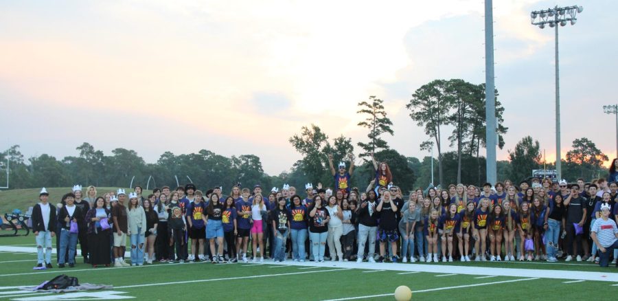 ALL TOGETHER. Members of the senior class join together for a picture.  at senior sunrise. 