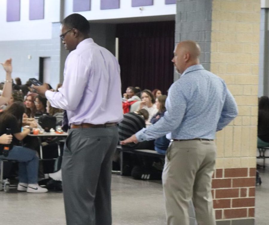 ON WATCH. Joining fellow principal Eric King, new AP Jamaal Hunnicutt spends time at lunch monitoring the cafeteria and meeting new students.  Hunnicutt comes from Atascocita High School where he has severed as an AP for three years. 