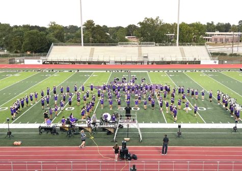 BAND BLUES. Showing off their hard work, the band premieres their show for parents at Yates Stadium. 