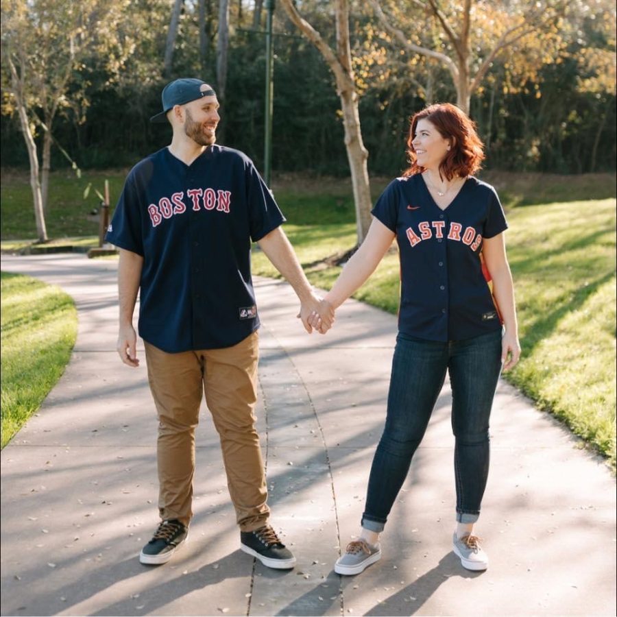 A HOUSE DIVIDED. Choir director Laurelyn Korfhage and her fiancé Jason Jankowski show off their favorite teams in an engagement photo. 