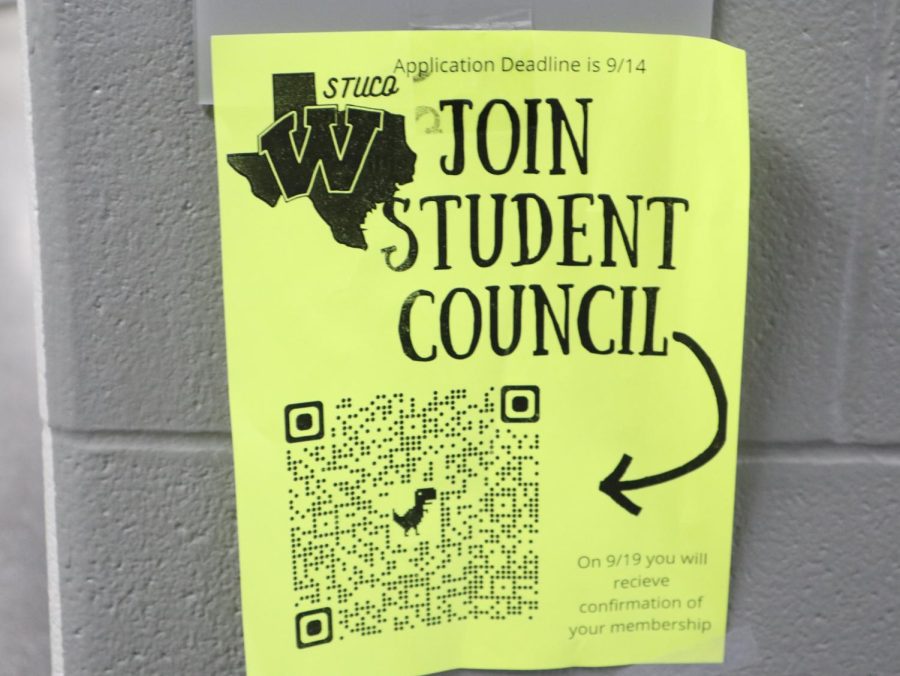 JOIN NOW. Signs all over campus encourage student to join Stu-Co. The application can be found by scanning the QR code.
