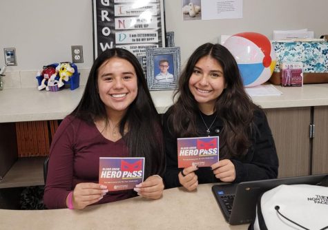 HERO PASS. HOSA members seniors Lizbeth Sanchez and Anai Rivera encourage all students 17 and older to sign up for the blood drive on Monday.  Give blood, be a hero.