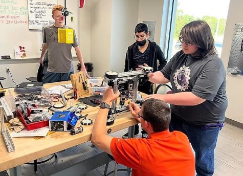 Robotiks team builds hard workers