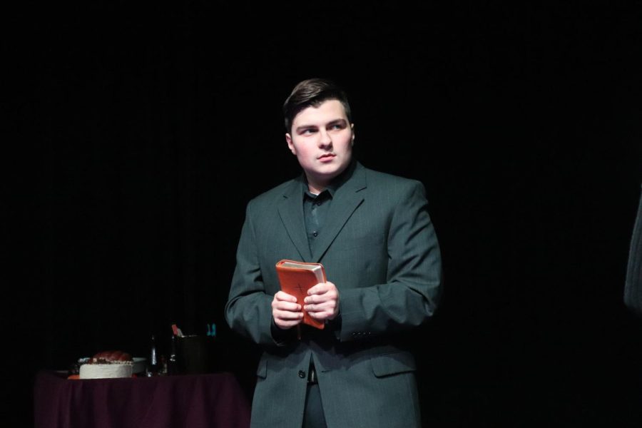 PREACHER MAN. Playing the role of Rev. Hooker in Dearly Departed, junior Tripp Brown perform in the Black Box. Drama 3-4 students performed their class play during the day and once in the evening for parents and the community.