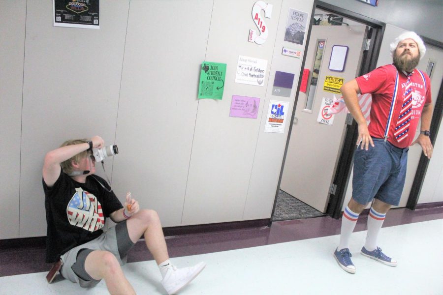 UNCLE SAM APPROVED. On Red, White and Blue day, senior Reid Henderson shoots a picture of English teacher Chris Slovak dresses as a modern Uncle Sam. Members of Wildkat Media write stories, take pictures and work in designing and posting stories. 