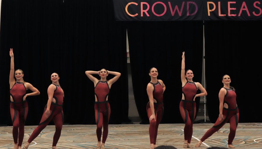 STRIKE A POSE. Ending their national champion kick routine, members of the Sweethearts close the dance in style. 