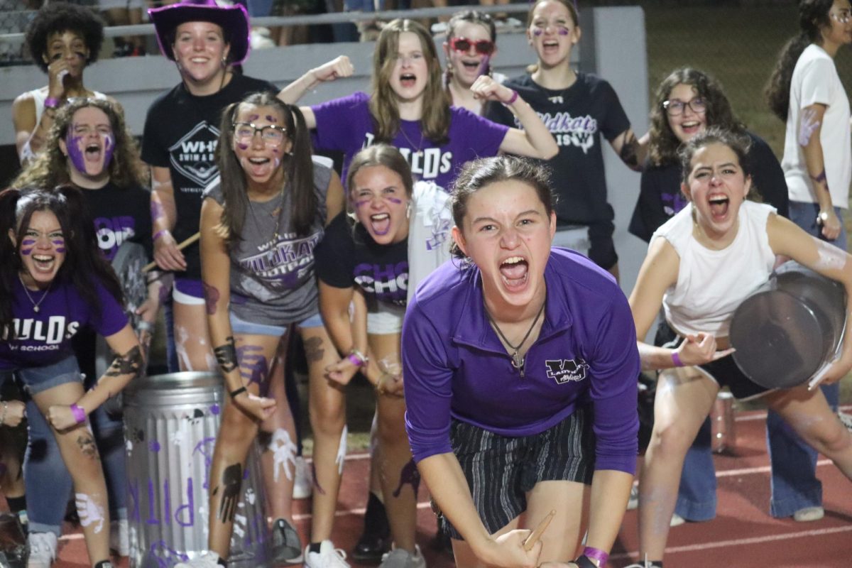 LETS GET LOUD. Leading the Pit Kru in a cheer, sophomore Zoe Mendes show her undying Wildkat spirit at the first home game against Temple. PitKru is still accepting new members. See Chris Slovak in A123 for more info.