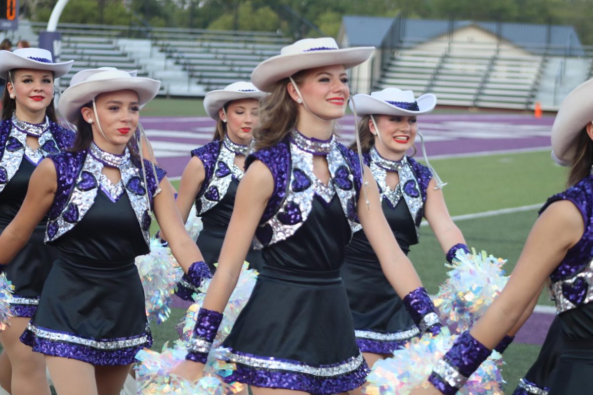SWEET SMILES. Marching to the victory line, Sweethearts debut their new uniform to the home crowd. 
