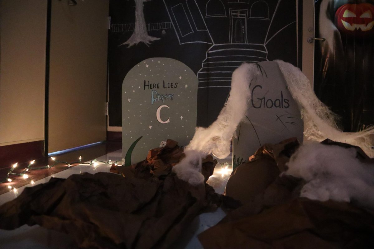 RIP GOALS. The spooky decorations at the end of the A-side third floor features spiders, skeletons and fake tombstones. The teachers at the end of the hall wanted to decorate to show a little spirit during Halloween. 