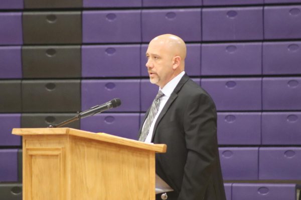 LONG LIVE THE KING. At the Veterans Day service held on Friday, principal Eric King speaks to the crowd. 