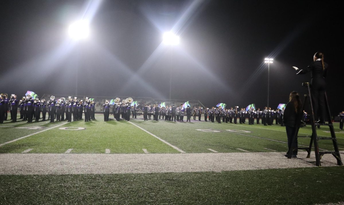 UNDER THE FRIDAY NIGHT LIGHTS. At the playoff game against Aldine Nimitz, the band plays during halftime. 