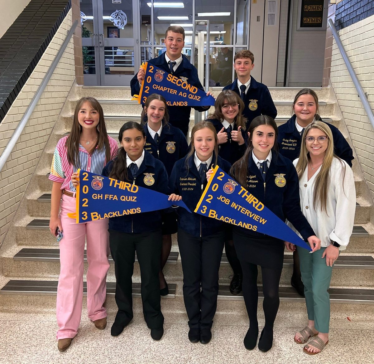 FUTURE LEADERS OF AMERICA. With the pennants won at a recent competition the leaderships joins ag teachers Tanis Price and Emma LeBlanc.