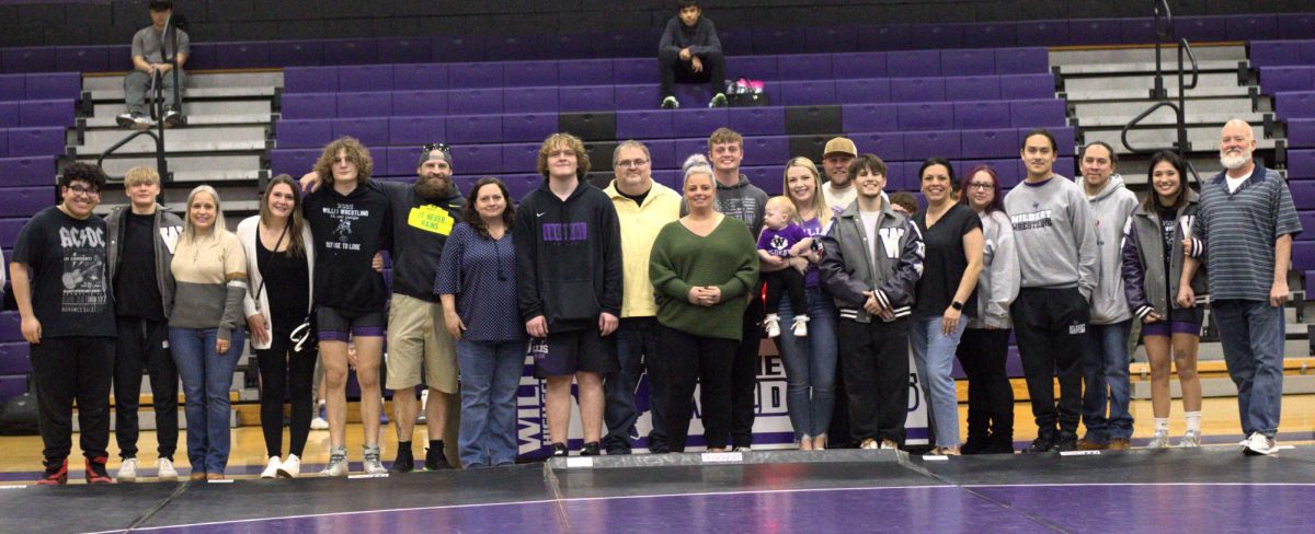 SENIOR+SEASON.+Wrestlers+of+the+class+of+2024+and+their+families+were+recognized+before+the+match+against+Grand+Oaks+on+senior+night.+