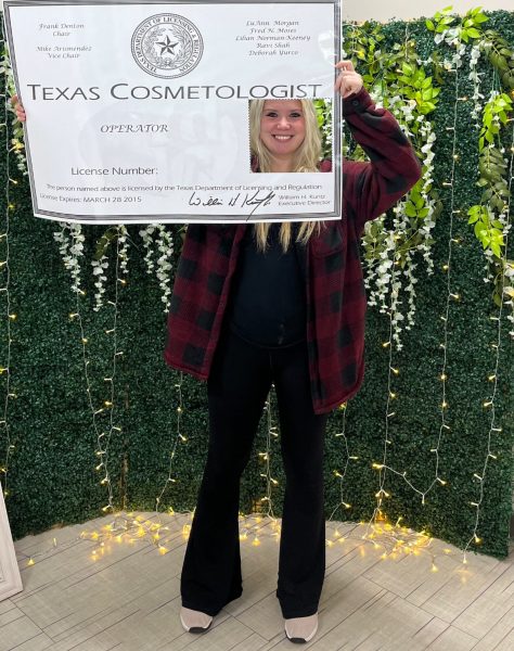 COSMETOLOGIST CERTIFIED. Devin Abernathy was the first junior to become a  licensed salon professional. Six other Wildkats have also be able to acquire their cosmetology license this year. 