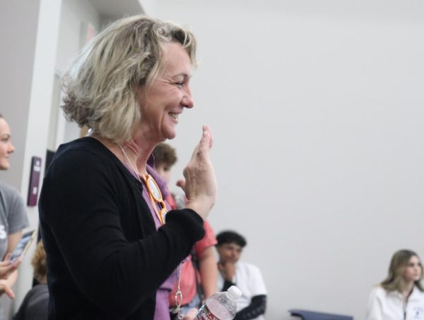 WILDKAT WELCOME. Dr. Kimberly James waves as she is introduced during the CTE Signing ceremony. “Im so excited to begin this new role as the superintendent, I cant wait to see how our programs grow and set our students up for success,” James said. 