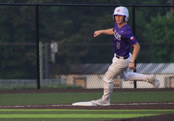 HEADED HOME. In a game against College Park, senior Tyler Brackenridge rounds third base to head home.  Round one of the play-offs begins tomorrow night at Wildkat Field. 