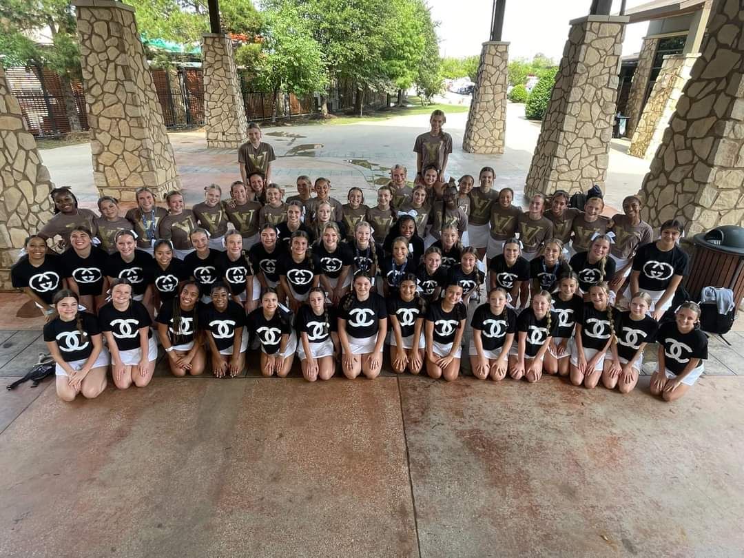 CHEER CAMP CONQUER. The cheerleaders snap a group picture at summer camp at Great Wolf Lodge. They won a handful of awards including the banana on day one.