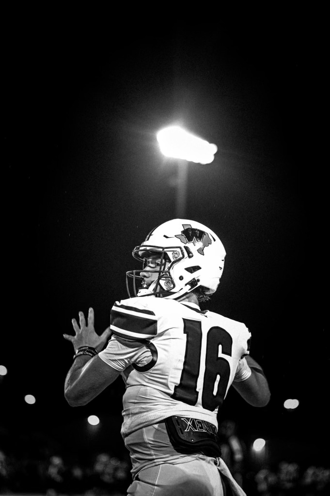 QUARTERBACK IN ACTION. Preparing to pass to a receiver down the field, senior Jack Emerson does his park to secure a 40-7 win over Klein Collins. 