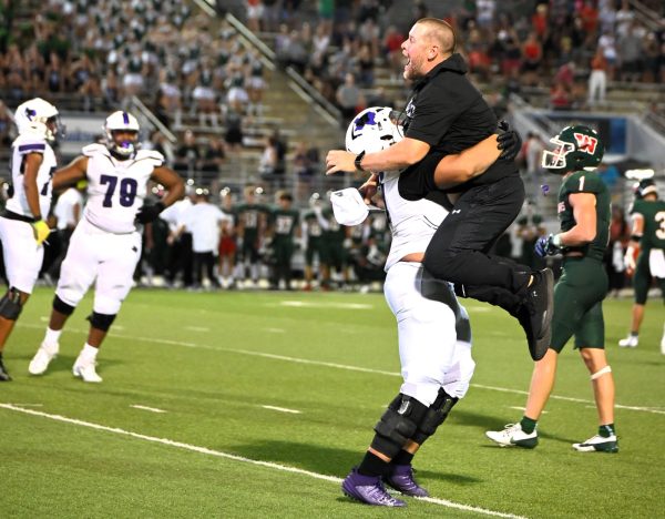 CELEBRATE. The clock hit zero and Coach Fitzgerald jumps into Day'jon Moore's arms. Willis beat The Woodlands 45-42. 