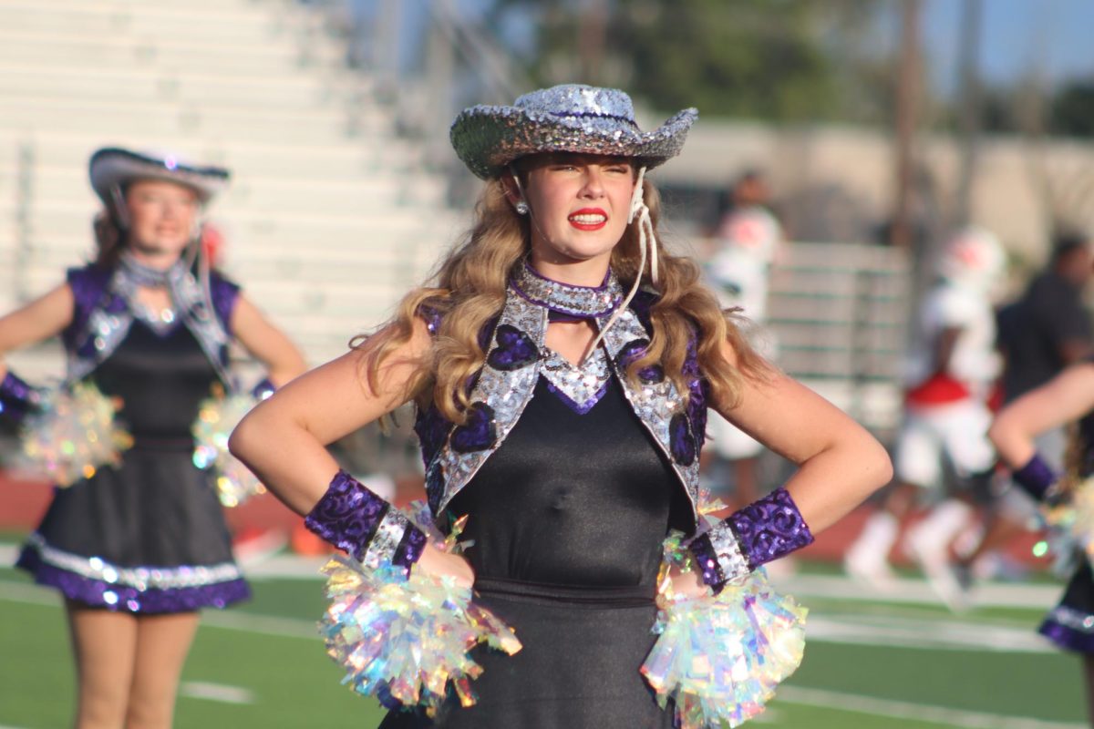 VICTORY LINE. Leading the Sweethearts in the victory line at the start of the game against Aldine Davis, Sweetheart captain Tori VanSchuyver takes part in the tradition of lining up before the game. The Sweethearts are an important part of the tradition of Fridays at Yates Stadium.  